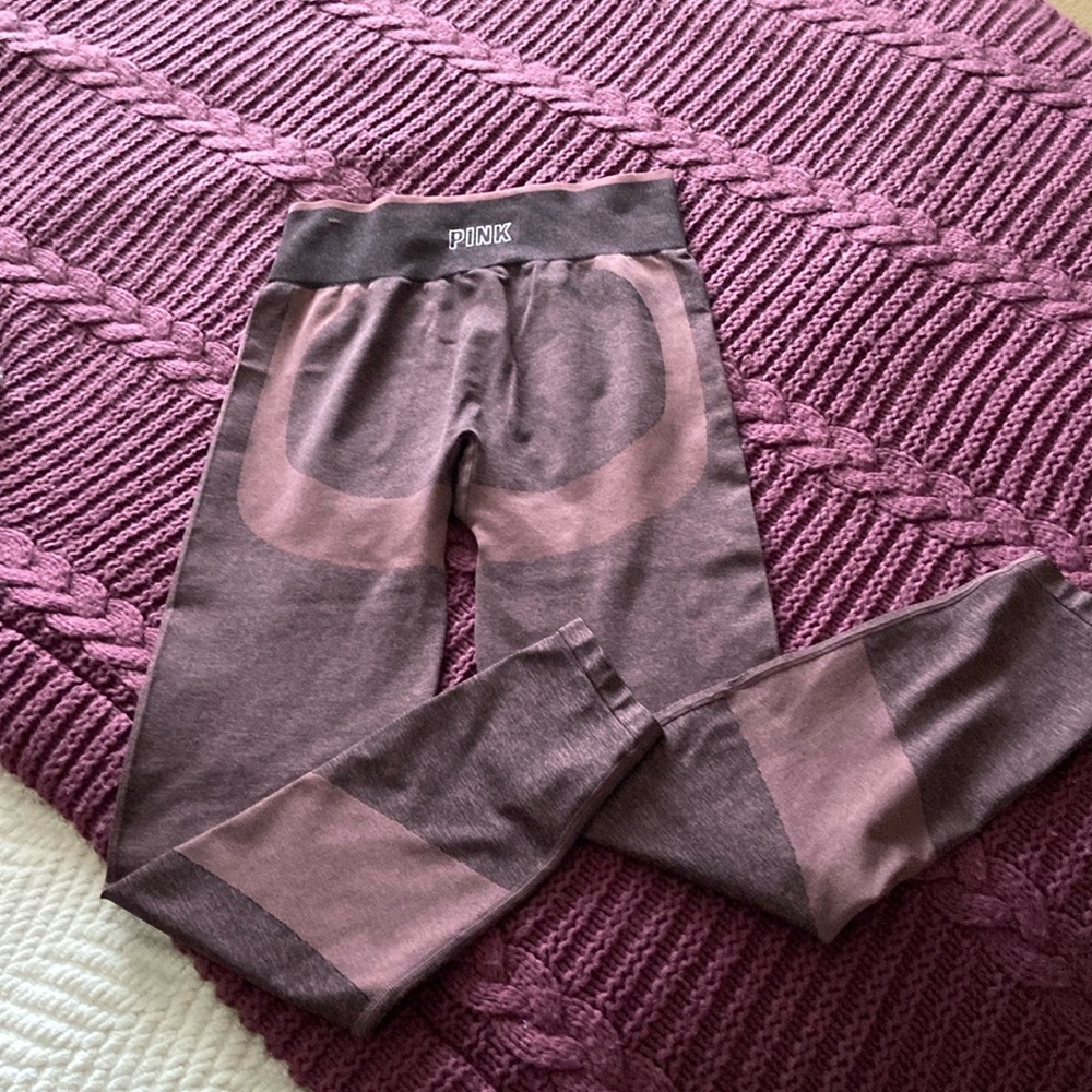 Tight high in the waist leggings. Maroon in color.